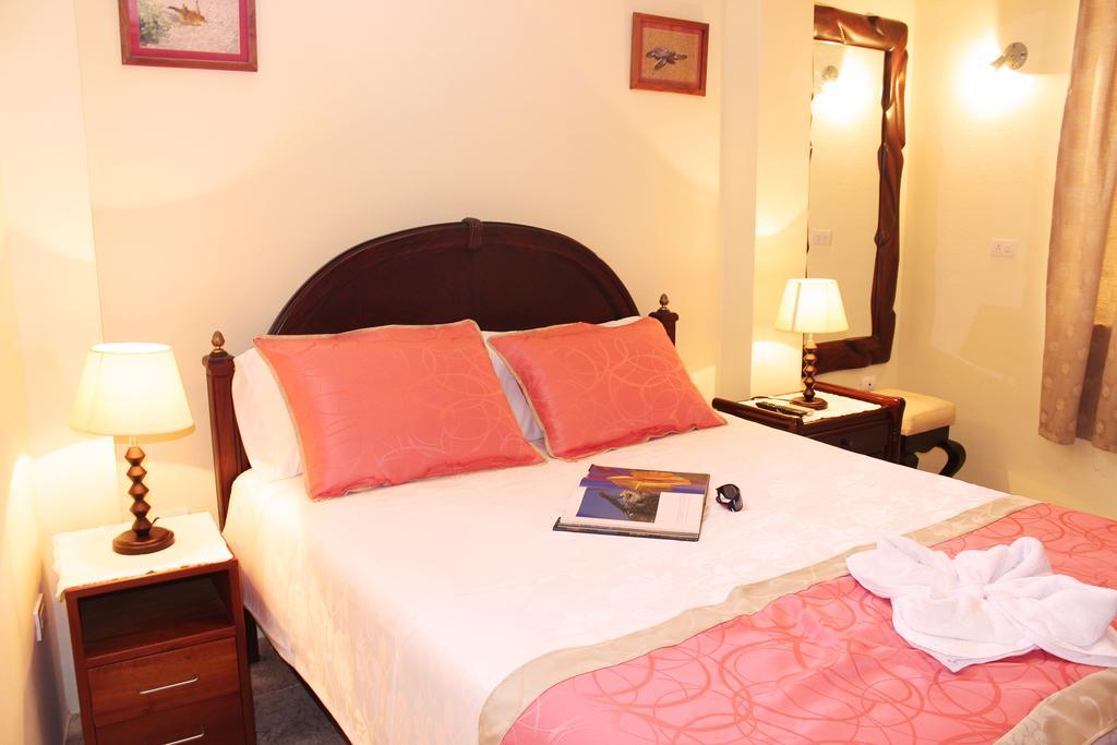 Hotel Del Sol Galapagos بويرتو أيورا الغرفة الصورة